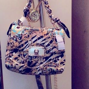 Aldo cross body and can be worn as a shoulder bag